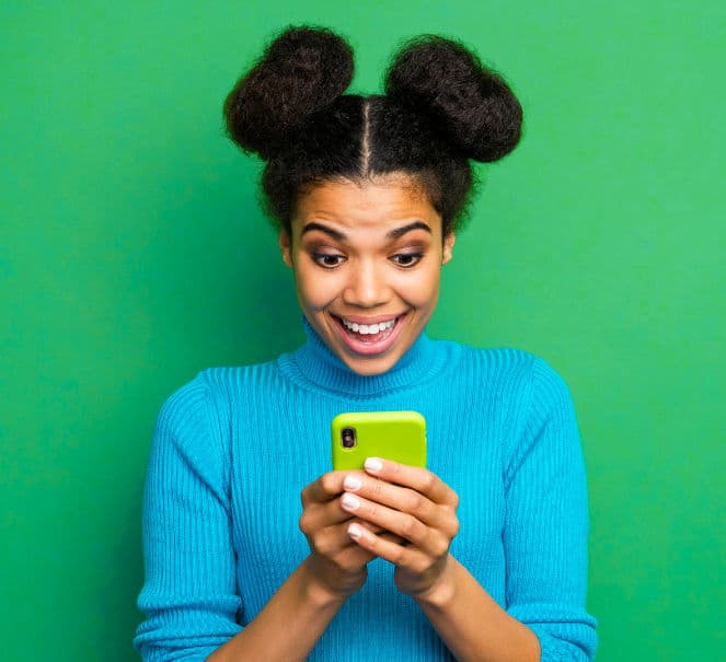 Find your next teaching job! Ethnic girl looking at phone.